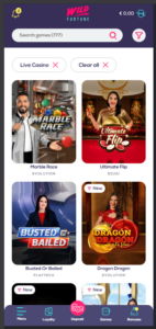 Wild Fortune Live Casino mobile view displaying 777 game tiles from Evolution, Ezugi, and Playtech providers.
