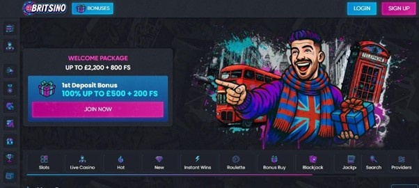 Britsino Casino homepage showing a colourful welcome package banner for a 1st deposit bonus of 100% up to &pound;500 plus 200 free spins, with a cartoon man in Union Jack clothes in front of a London bus and phone box, and a game menu bar with categories like Slots, Live Casino, Roulette and Blackjack. 